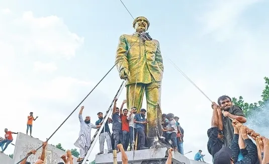 Image from the recent crisis show large groups of people clashing with symbols of national pride, including the defacement of Sheikh Mujibur Rahman's statue  